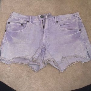 Free People high waisted lilac distressed jean shorts